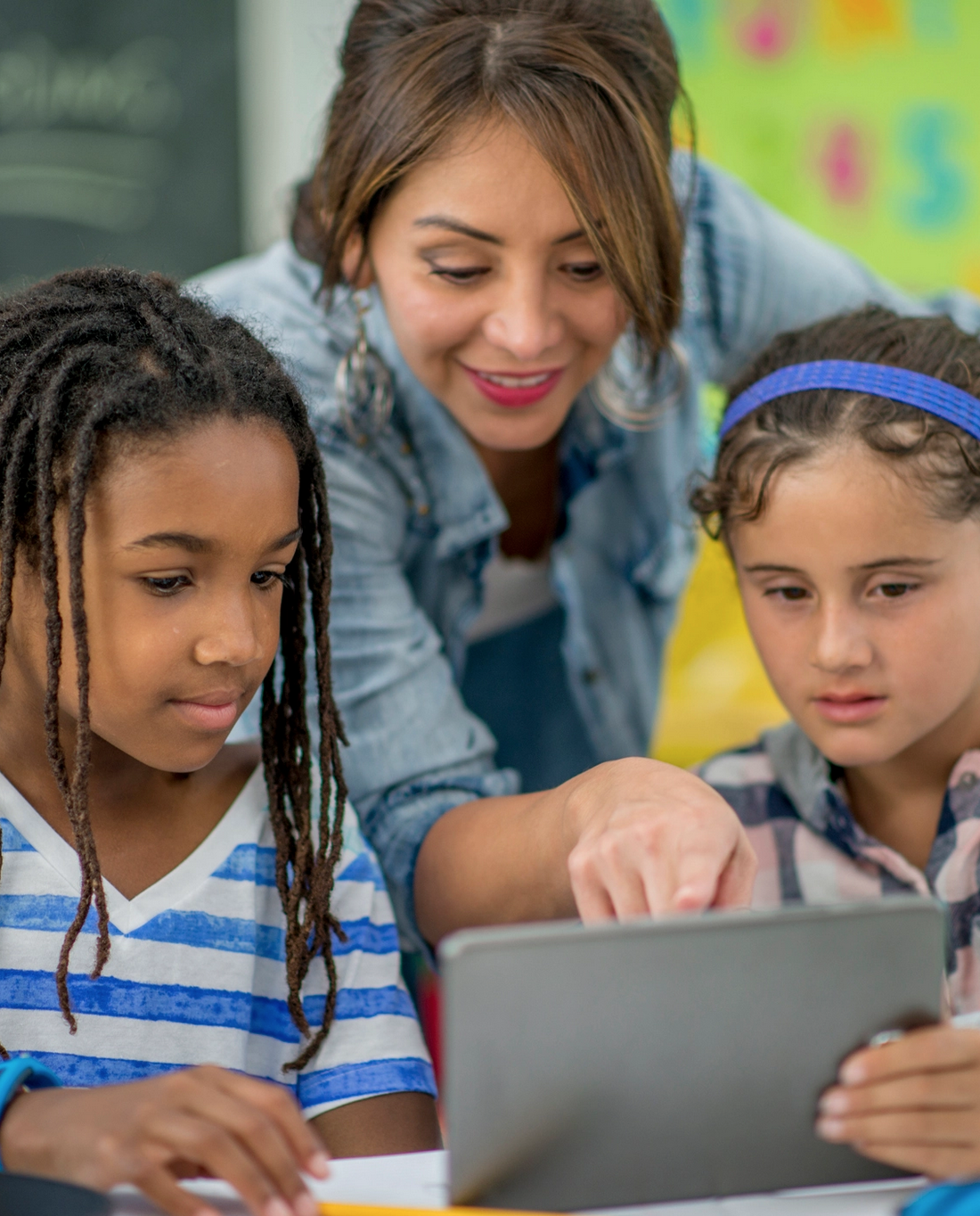 teacher with two students