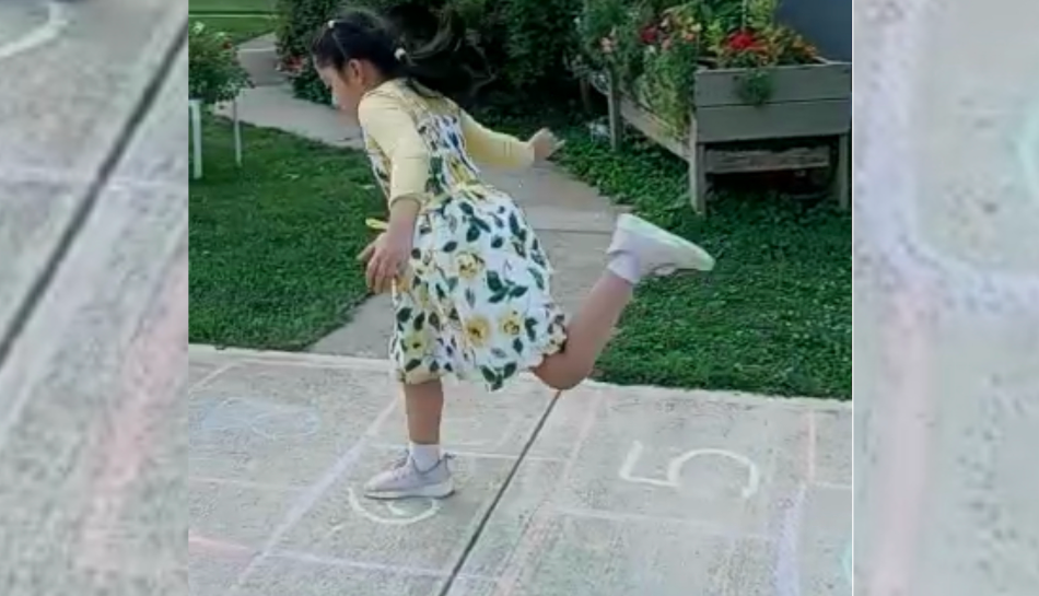Child playing hopscotch