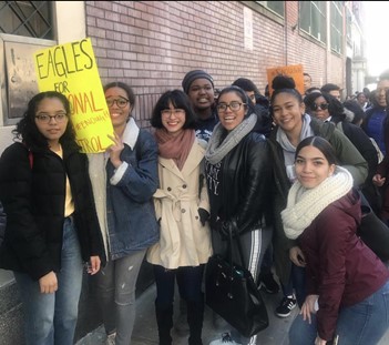 feminist club members at an in person meeting