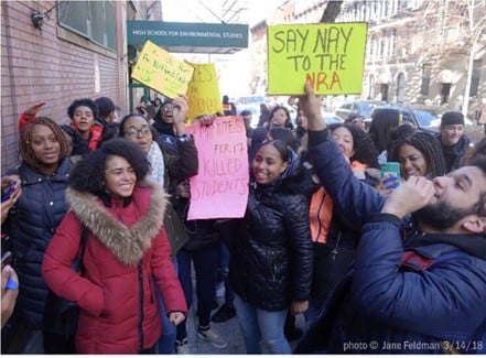 feminist club members at an in person meeting